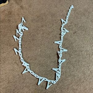 White hanging chain for toys